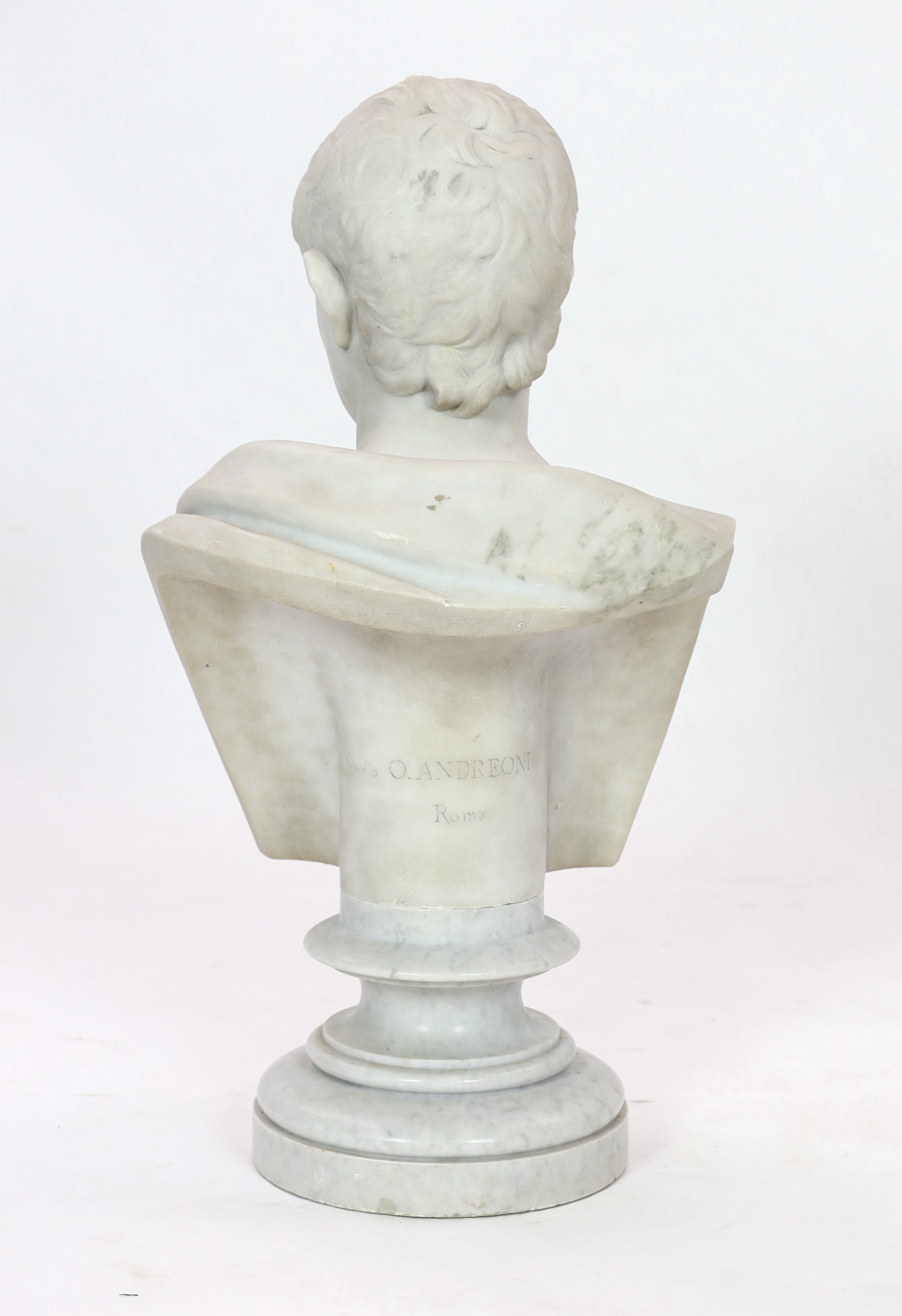 Studio of Orazio Andreioni (c.1840-1895), a 19th century Italian white marble bust of a Roman Emperor, possibly Tiberius, 41cm wide, 30cm deep, overall 75cm high, Please note this lot attracts an additional import tax of